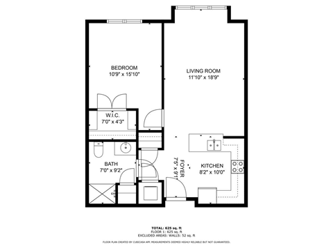 A floor plan for a small apartment with a bedroom, living room, kitchen, and bath.